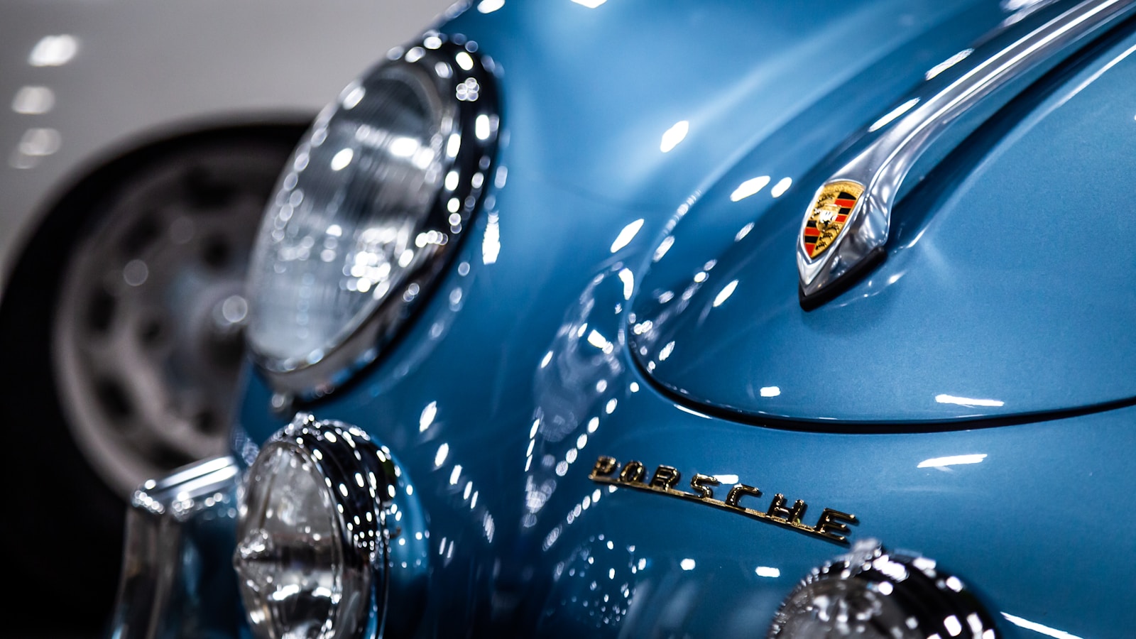 A close up of a shiny blue car